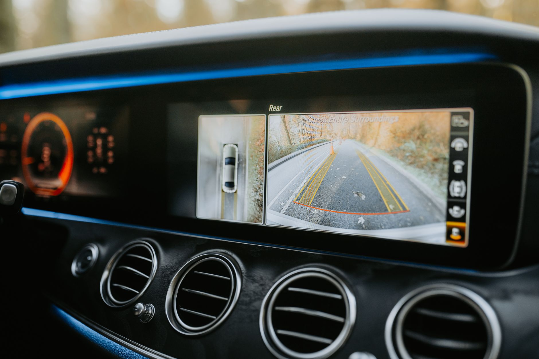 Close-up of a car dashboard showcasing a rear-view camera display and modern electronics. — Can any mattress go on an adjusta