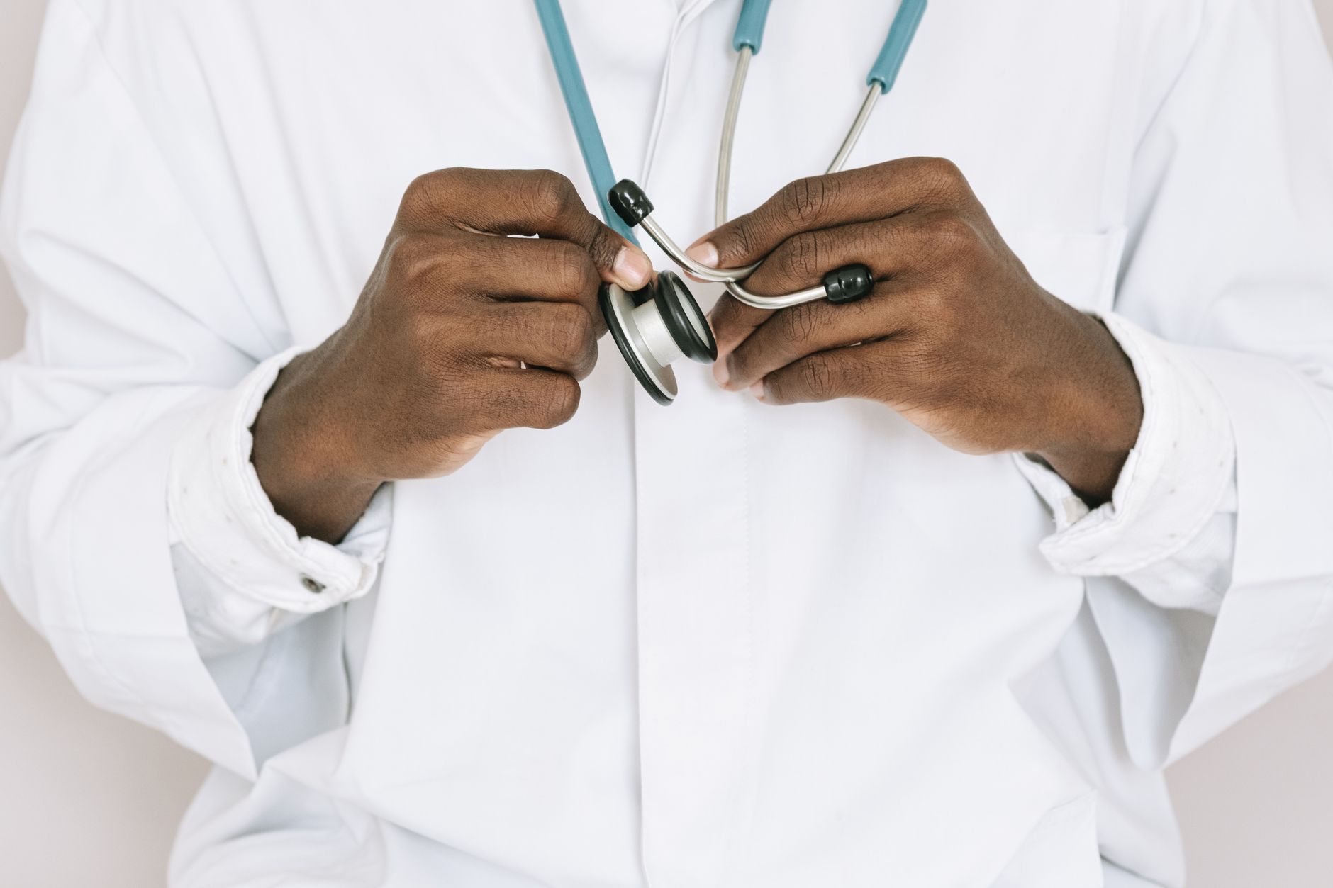 A professional doctor holding a stethoscope, focusing on hands and medical tools. — Create a Unique, Personalized Recovery Pl
