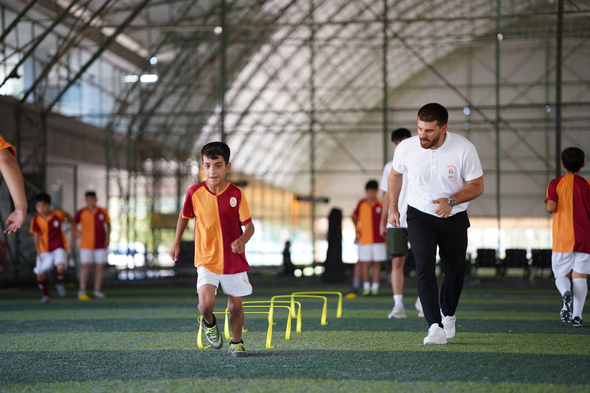 Energetic indoor soccer training with kids and coach, focusing on agility and teamwork. — How To Get The Best Custom CBD Bake