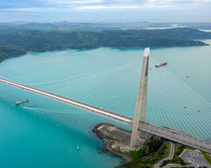 Explore the stunning architecture of Yavuz Sultan Selim Bridge in Istanbul, Türkiye, spanning the turquoise Bosphorus Strait.