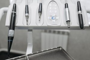 Detailed shot of modern dental tools in a dentist's office, emphasizing precision and hygiene. — Kids Toothpaste: How to Avoi