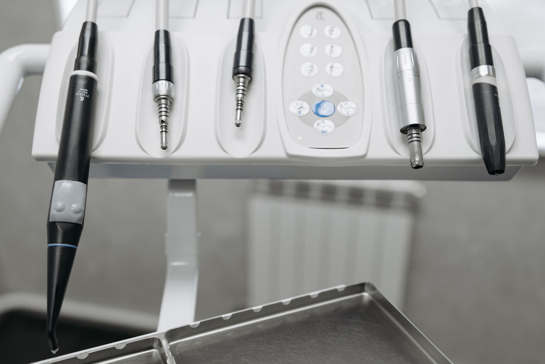 Detailed shot of modern dental tools in a dentist's office, emphasizing precision and hygiene. — Kids Toothpaste: How to Avoi