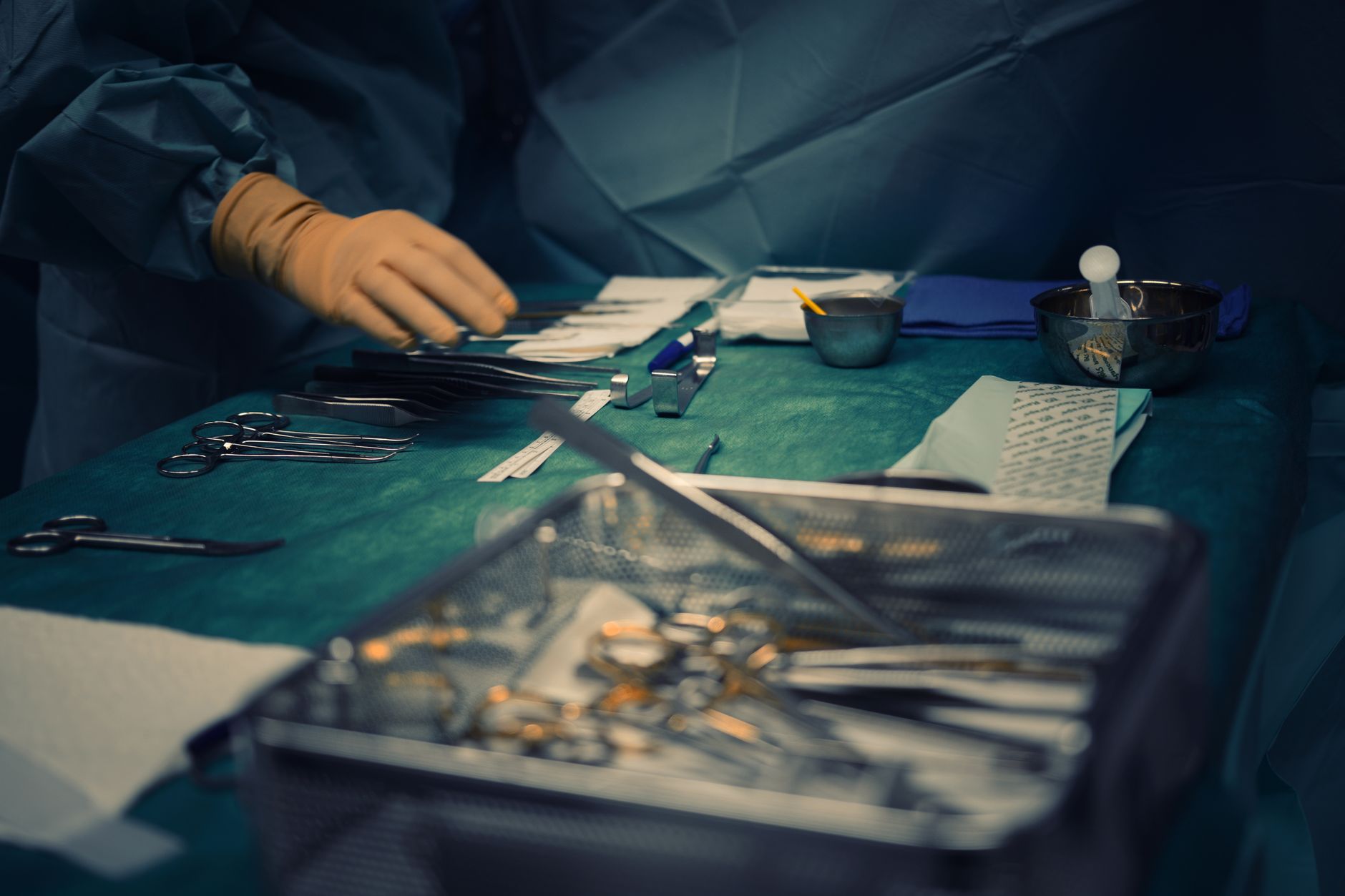 Close-up of surgical instruments prepared for surgery in a hospital operating room. — Obstetricians: A Key To Understanding I