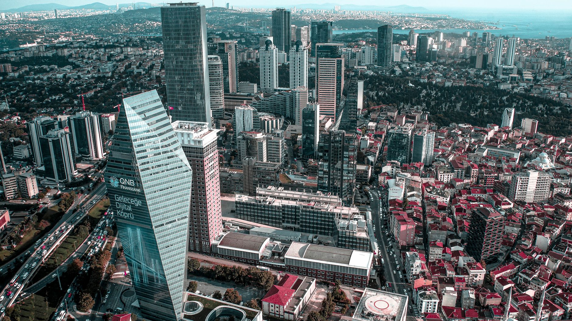 A breathtaking aerial view of Istanbul's skyline featuring skyscrapers and high-rise buildings. — The Pros and Cons of Tradit