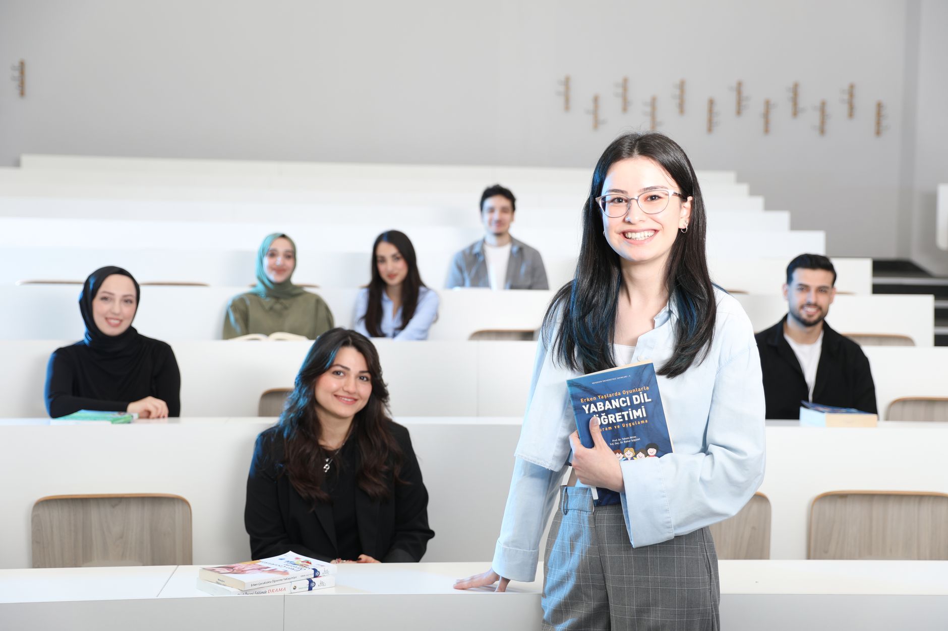Group of diverse university students in a bright lecture hall, studying language education. — Winning SEO Game for Jeetwin: K